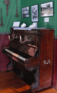Piano in the Bakerville café has character